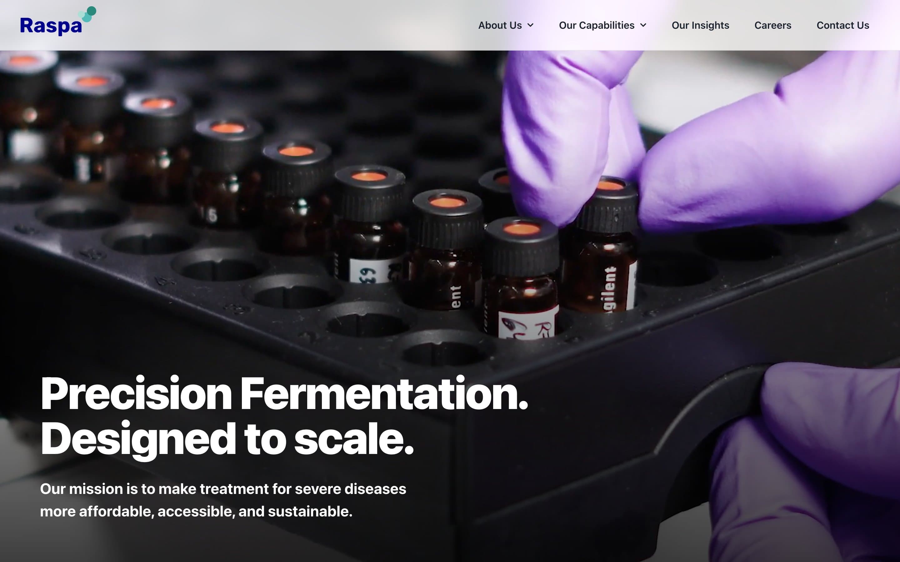 Raspa Pharma homepage: “Precision Fermentation. Designed to scale.” over a video still of sample vials, with the mission to make treatment for severe diseases more affordable, accessible and sustainable.